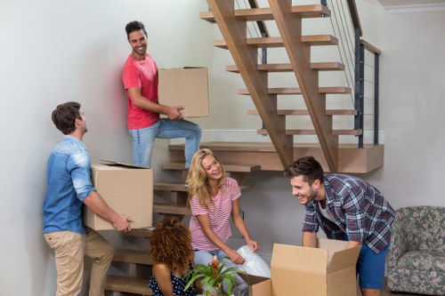 Packing boxes and wrapping materials prepared for a Greenwich home move