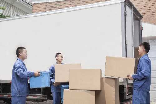 Local office relocation van positioned for a Greenwich business move