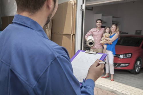 Packing and loading household items for a Greenwich relocation
