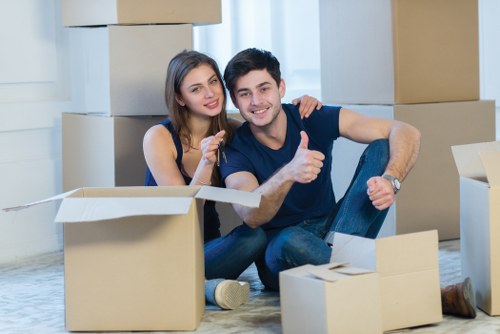 Furniture and workspace items being organized for a local commercial move
