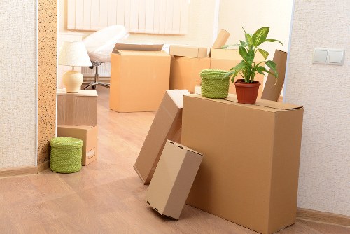 Packed boxes and furniture ready for urgent collection in Greenwich