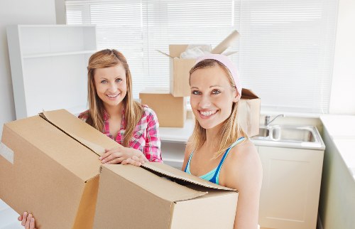 Boxes and furniture being loaded for a Greenwich home relocation