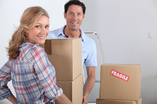 Office relocation support in Greenwich with desks and equipment ready for transport