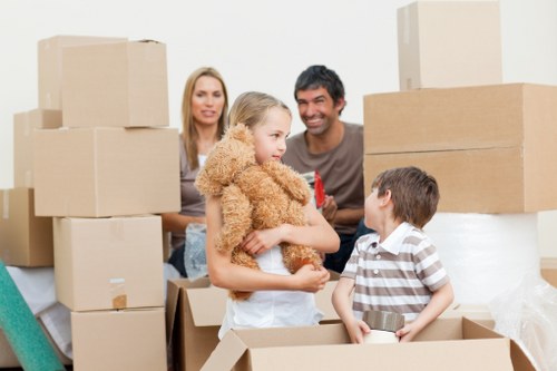 Furniture being unloaded at a new home during a Greenwich move